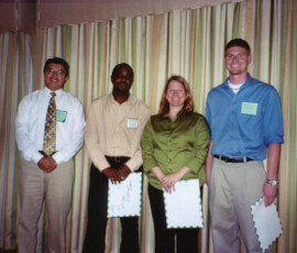 Marco Toapanta with winners of the FES 2005 MS-level student paper contest (left to right): Antonio Francis (2nd), Linda NcHerne (1st), and Frank Wessels (3rd)